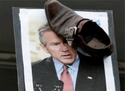 Джордж Буш-младший отменил визит в Швейцарию, испугавшись ареста