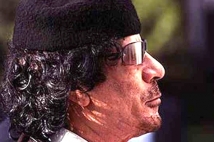 Каддафи похоронили в ливийской пустыне 